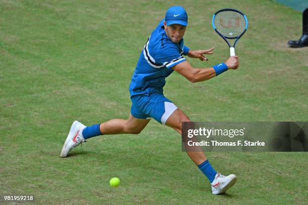 Borna Coric of Croatia plays a backhand in his half final match against Roberto Bautista Agut of Spain during day six of the Gerry Weber Open at...