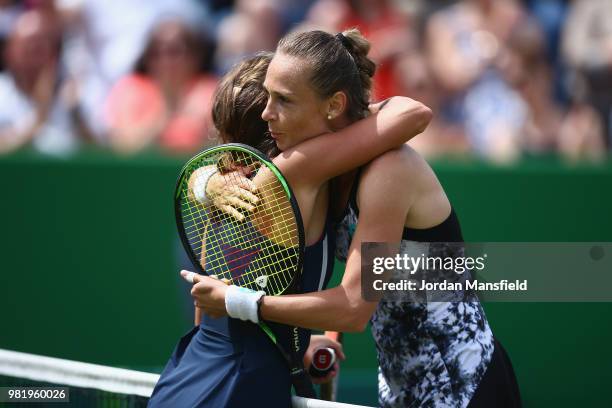 Magdalena Rybarikova of Slovakia embraces Barbora Strycova of the Czech Republic at the net during her singles semi-final match against Barbora...