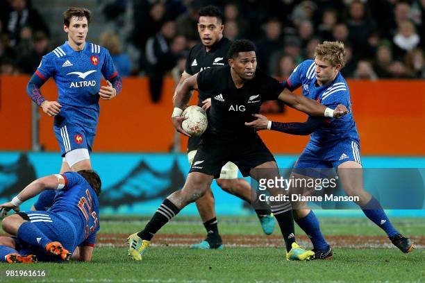 Waisake Naholo of the All Blacks is tackled by Jules Plisson of France during the International Test match between the New Zealand All Blacks and...