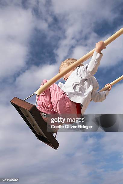 girl on swing - oliver eltinger stock pictures, royalty-free photos & images