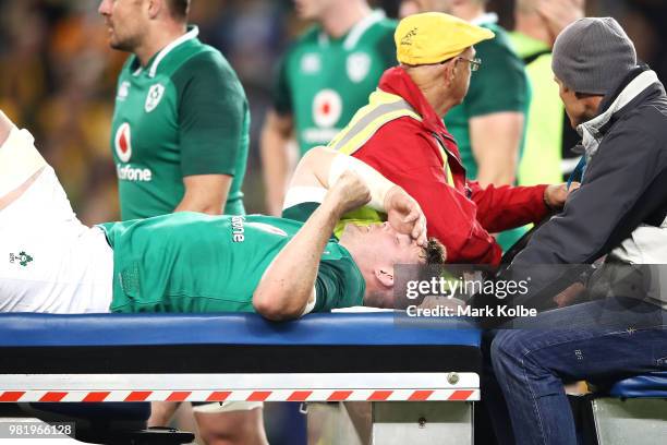 Peter O'Mahony of Ireland leaves the field on a medicab before leaving the field during the Third International Test match between the Australian...