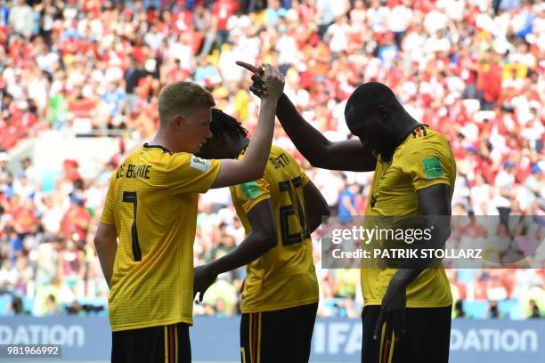 Belgium's forward Romelu Lukaku celebrates his second goal, and his team's third, with Belgium's midfielder Kevin De Bruyne during the Russia 2018...