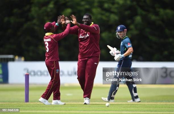 Rahkeem Cornwall of West Indies celebrates after getting Liam Livingstone of England out during the Tri-Series International match between England...