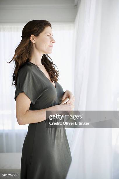 woman thinking - oliver eltinger stock pictures, royalty-free photos & images
