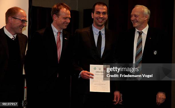 Markus Babbel receives his DFB Football Trainer Certificate from Matthias Sammer , Wolfgang Fischer and Hans-Georg Moldenhauer at the Inter Conti...