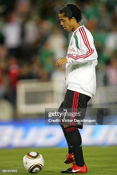 Giovani Dos Santos of Mexico warms up prior to their International Friendly match against New Zealand at the Rose Bowl on March 3, 2010 in Pasadena,...