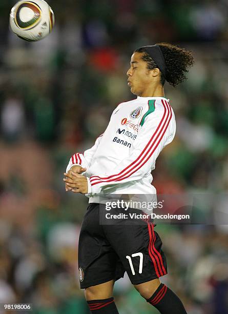 Giovani Dos Satnos of Mexico warms up prior to their International Friendly match against New Zealand at the Rose Bowl on March 3, 2010 in Pasadena,...