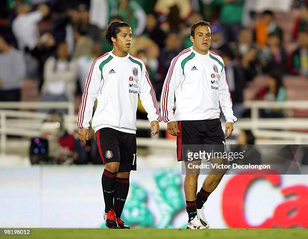Giovani Dos Santos and Cuauhtemoc Blanco of Mexico looks on during warm-up prior to their International Friendly match against New Zealand at the...