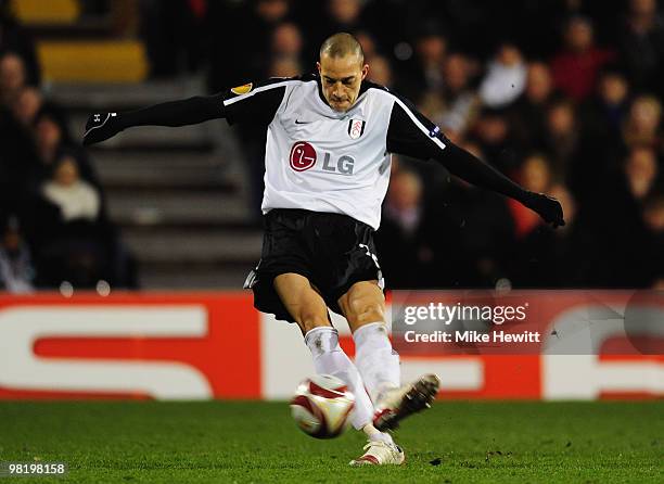 Bobby Zamora of Fulham scores their first goal during the UEFA Europa League quarter final first leg match between Fulham and Vfl Wolfsburg at Craven...