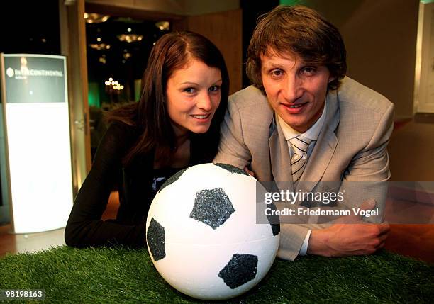 Ralf Santelli and his wife pose after receiving the DFB Football Trainer Certificate at the Inter Conti hotel on April 1, 2010 in Cologne, Germany.