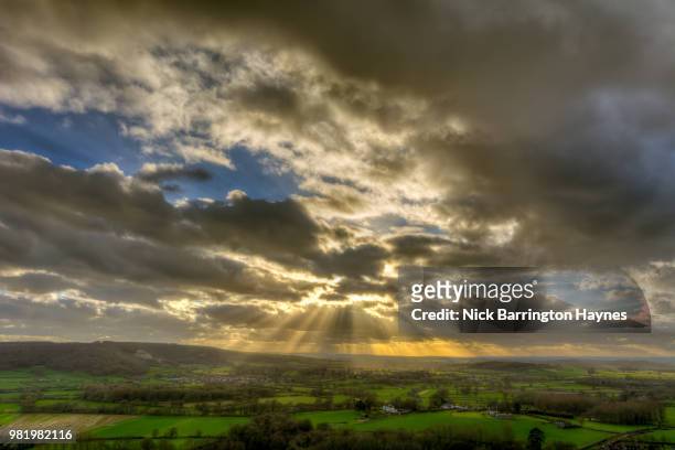 countryside sun rays - nick haynes stock pictures, royalty-free photos & images