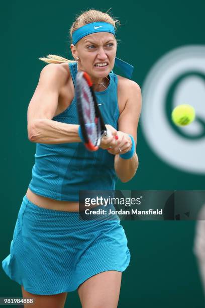 Petra Kvitova of the Czech Republic plays a backhand during her singles semi-final match against Mihaela Buzarnescu of Romania during day eight of...