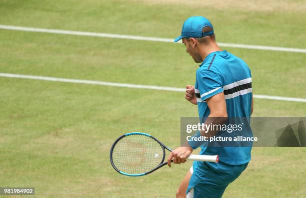 June 2018, Germany, Halle: Tennis, ATP-Tour, Singles, Men, Semi-Finals: Borna Coric from Croatia clenches his fist during his match against Bautista...