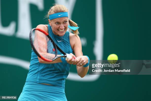 Petra Kvitova of the Czech Republic plays a backhand during her singles semi-final match against Mihaela Buzarnescu of Romania during day eight of...