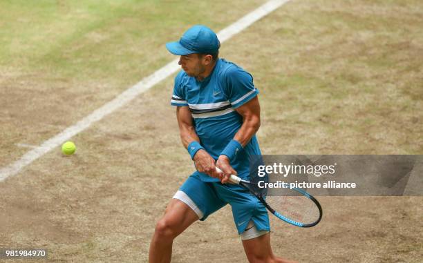 June 2018, Germany, Halle: Tennis, ATP-Tour, Singles, Men, Semi-Finals: Borna Coric from Croatia in action against Bautista Agut from Spain. Photo:...