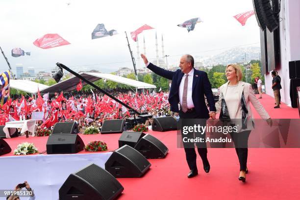 Republican Peoples Party's presidential candidate Muharrem Ince and his wife Ulku Ince greet the crowd during his rally within his election campaign...