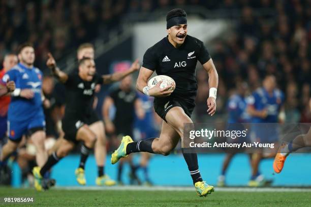 Rieko Ioane of the All Blacks makes a break to score a try during the International Test match between the New Zealand All Blacks and France at...