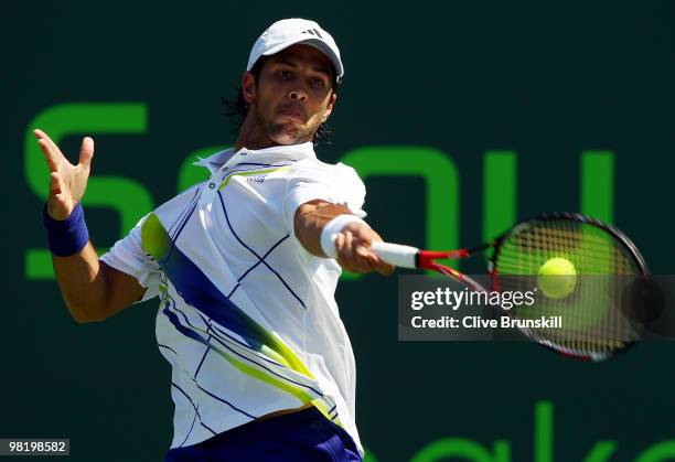 Fernando Verdasco of Spain returns a shot against Tomas Berdych of the Czech Republic during day ten of the 2010 Sony Ericsson Open at Crandon Park...