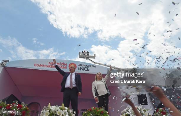 Muharrem Ince, presidential candidate of Turkey's main opposition Republican People's Party and his wife Ulku Ince waves to supporters during a...