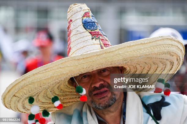 Mexico's fan poses as he arrives for the Russia 2018 World Cup Group F football match between South Korea and Mexico at the Rostov Arena in...