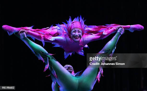 Acrobats of the Canadian circus company Cirque du Soleil perform at Olympia Stadion during a rehearsal of the new show 'Varekai' on March 31, 2010 in...