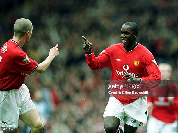 Dwight Yorke of Man Utd celebrates with Roy Keane after scoring the first goal during the Manchester United v Coventry City FA Carling Premiership...
