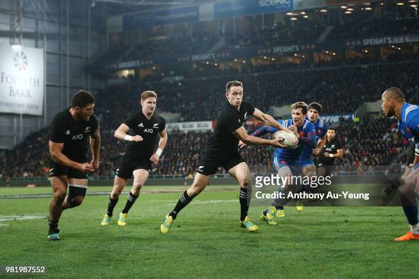 Ben Smith of the All Blacks makes a run during the International Test match between the New Zealand All Blacks and France at Forsyth Barr Stadium on...
