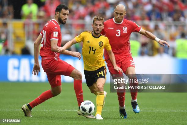 Belgium's forward Dries Mertens dribbles past Tunisia's defender Hamdi Nagguez and Tunisia's defender Yohan Benalouane during the Russia 2018 World...