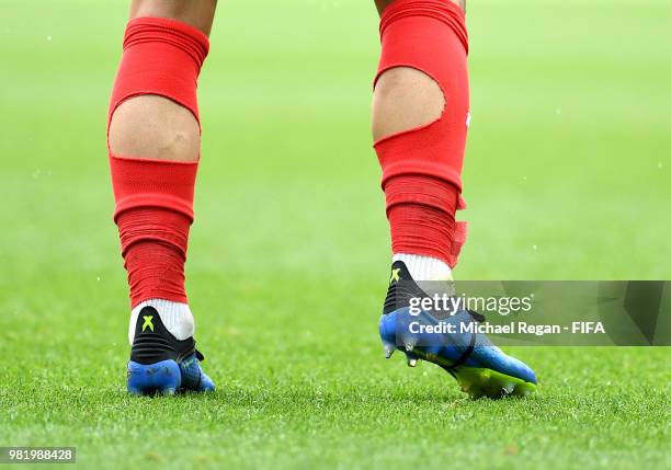 Detailed view showing holes in socks of Yohan Ben Alouane of Tunisia during the 2018 FIFA World Cup Russia group G match between Belgium and Tunisia...