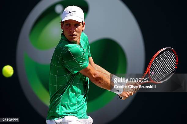 Tomas Berdych of the Czech Republic returns a shot against Fernando Verdasco of Spain during day ten of the 2010 Sony Ericsson Open at Crandon Park...