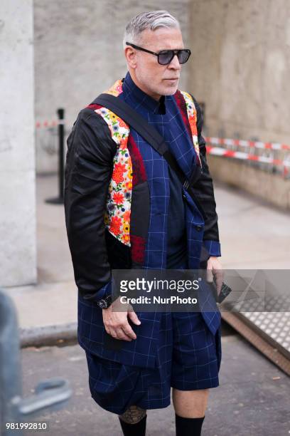 Nick Wooster navy plaid shorts is seen outside Dries Van Noten on day three of Paris Fashion Week Menswear SS19 on June 21, 2018 in Paris, France.