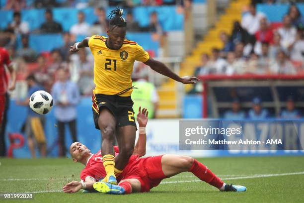 Yohan Ben Alouane of Tunisia challenges Michy Batshuayi of Belgium during the 2018 FIFA World Cup Russia group G match between Belgium and Tunisia at...