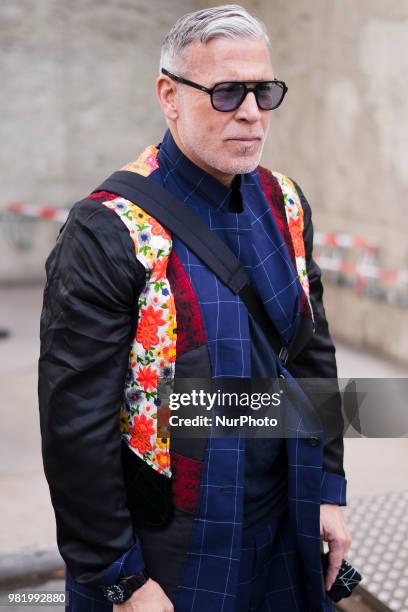 Nick Wooster navy plaid shorts is seen outside Dries Van Noten on day three of Paris Fashion Week Menswear SS19 on June 21, 2018 in Paris, France.