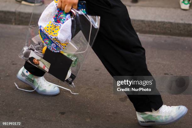 Guest is seen during Paris Fashion Week Mens Spring/Summer 2019 on June 21, 2018 in Paris, France.