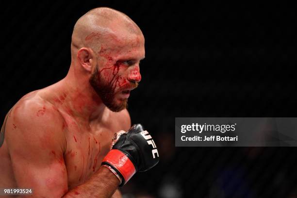 Donald Cerrone battles Leon Edwards of Jamaica in their welterweight bout during the UFC Fight Night event at the Singapore Indoor Stadium on June...