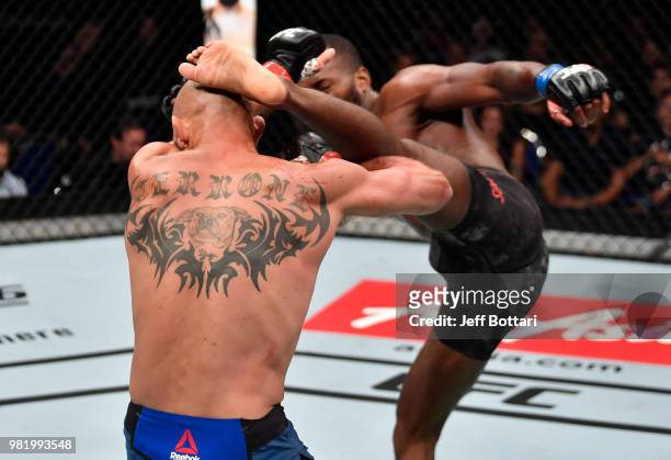 Leon Edwards of Jamaica kicks Donald Cerrone in their welterweight bout during the UFC Fight Night event at the Singapore Indoor Stadium on June 23,...