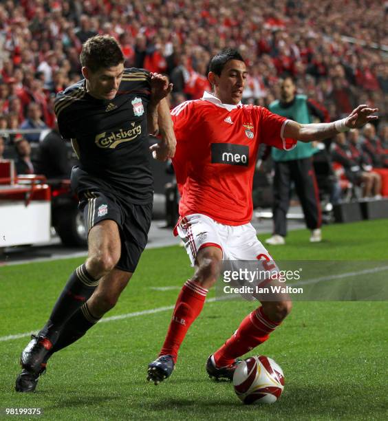 Angel Di Maria of Benfica battles for the ball with Steven Gerrard of Liverpool during the UEFA Europa League quarter final first leg match between...