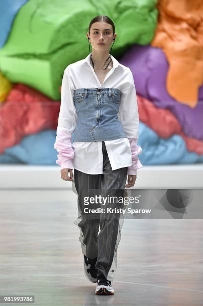 Model walks the runway during the Andrea Crews Menswear Spring/Summer 2019 show as part of Paris Fashion Week on June 23, 2018 in Paris, France.