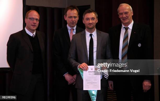 Mario Himsl receives his DFB Football Trainer Certificate from Matthias Sammer , Wolfgang Fischer , Hans-Georg Moldenhauer at the Inter Conti hotel...