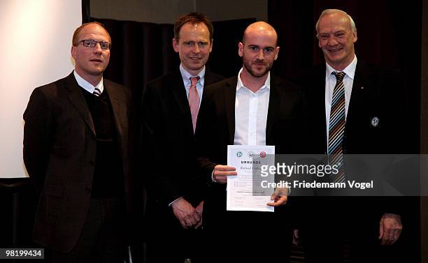 Roland Vrabec receives his DFB Football Trainer Certificate from Matthias Sammer , Wolfgang Fischer Hans-Georg Moldenhauer at the Inter Conti hotel...