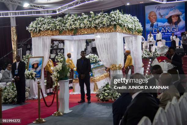 Followers of controversial Congolese preacher Elisabeth Wosho Onyumbe known as "Maman Olangi" arrive at her funeral in Kinshasa on June 23, 2018. -...