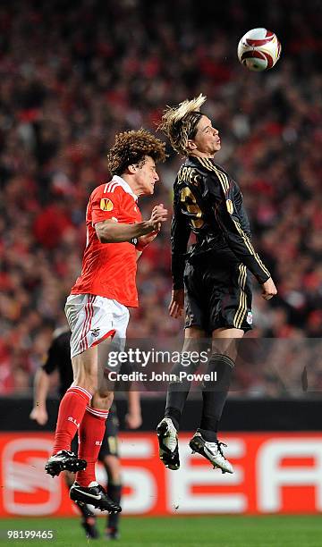 Fernando Torres competes in the air with David Luiz of Benfica during the UEFA Europa League quarter final first leg match between Benfica and...