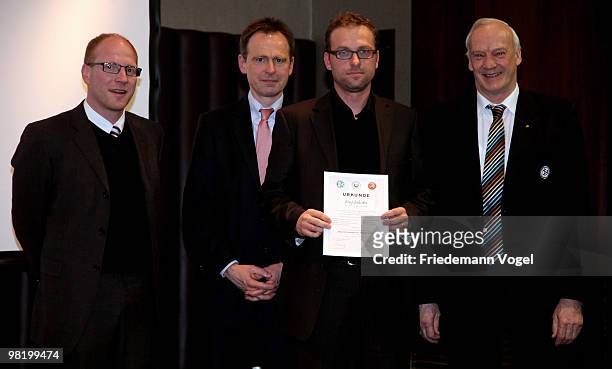 Joerg Jakobs receives his DFB Football Trainer Certificate from Matthias Sammer , Wolfgang Fischer Hans-Georg Moldenhauer at the Inter Conti hotel on...