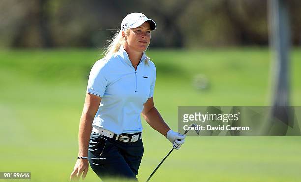 Suzann Pettersen of Norway plays her second shot at the 18th hole during the first round of the 2010 Kraft Nabisco Championship, on the Dinah Shore...