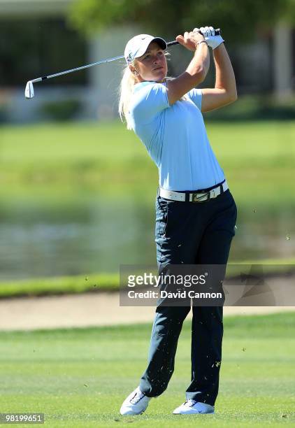 Suzann Pettersen of Norway plays her third shot at the 18th hole during the first round of the 2010 Kraft Nabisco Championship, on the Dinah Shore...