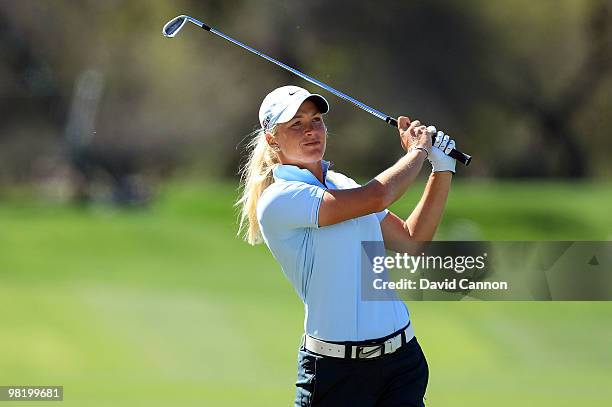 Suzann Pettersen of Norway plays her second shot at the 18th hole during the first round of the 2010 Kraft Nabisco Championship, on the Dinah Shore...