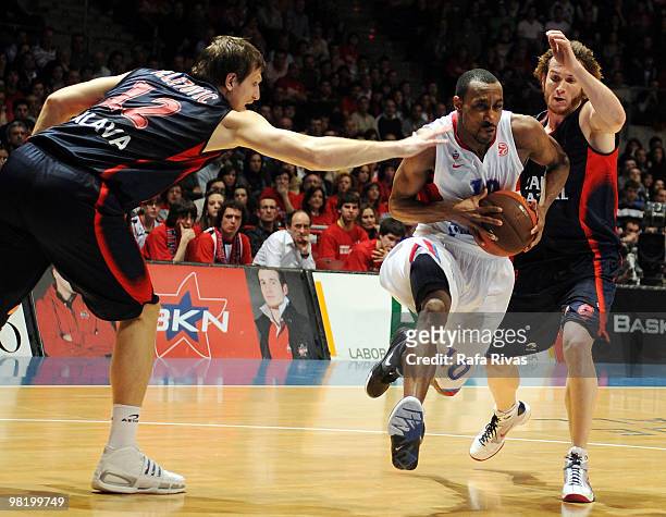 Holden, #10 of CSKA Moscow competes with Marcelinho Huertas, #9 and Mirza Teletovic, #12 of Caja Laboral during the Euroleague Basketball 2009-2010...