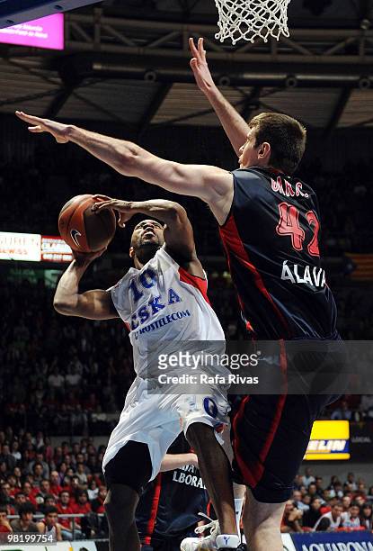 Holden, #10 of CSKA Moscow competes with Stanko Barac, #42 of Caja Laboral during the Euroleague Basketball 2009-2010 Play Off Game 4 between Caja...