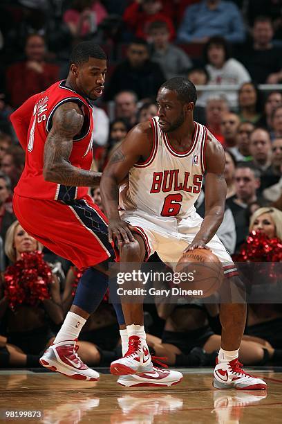 Ronald Murray of the Chicago Bulls handles the ball against Terrence Williams of the New Jersey Nets during the game on March 27, 2010 at the United...