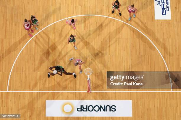 Jhaniele Fowler of the Fever catches a pass during the round eight Super Netball match between the Fever and the Thunderbirds at Perth Arena on June...